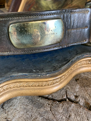 A very large old leather dog collar