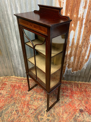 An Edwardian inlaid glass display cabinet