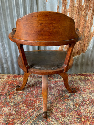 A Victorian ball arm desk chair