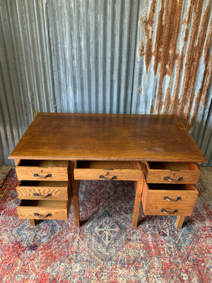 A teacher's style wooden desk