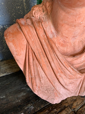 An oversized terracotta bust of Niobe