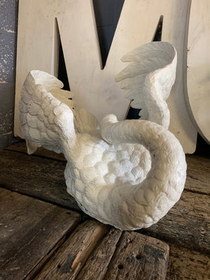 A large white swan sculpture