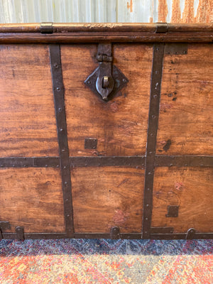 An 18th Century cast iron-banded wooden chest