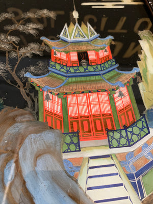 A large reverse painted glass pagoda picture