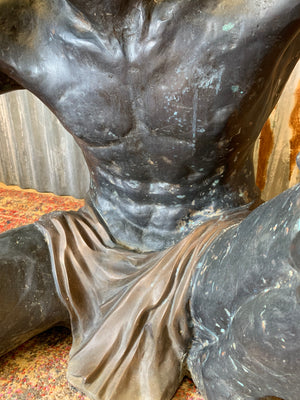 A large bronze blackamoor statue