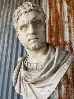 A cast stone bust of Roman Emperor Caracalla on column