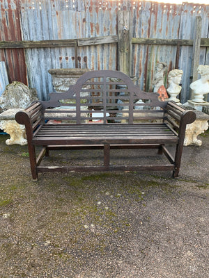 A large Lutyens wooden bench