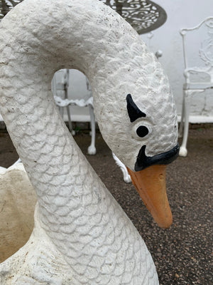 A very large cast stone swan planter