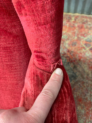 A pair of French red velvet armchairs