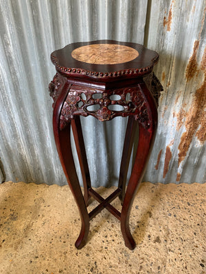 A Chinese jardinière pedestal stand with rose marble top