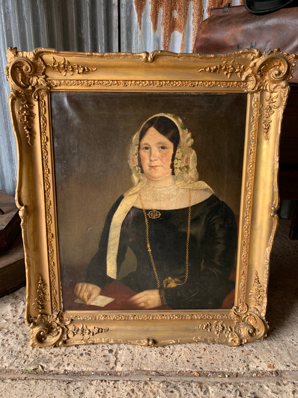 A large 19th century oil on canvas portrait of a lady