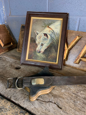 A very large old leather dog collar