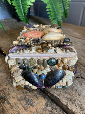 A medium seashell encrusted trinket box