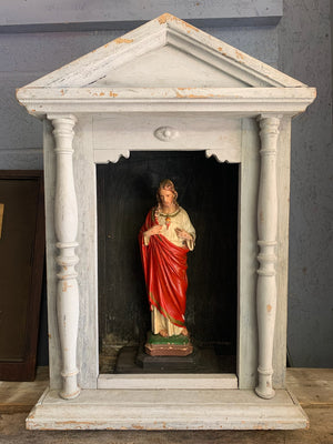 A wooden shrine display cabinet