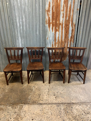 A set of 4 wooden 19th century chapel chairs