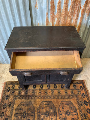 A small black ebonised cupboard with single drawer