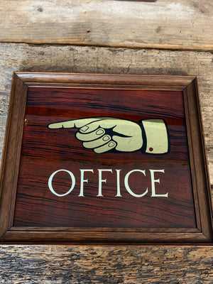 A reverse painted "Office" sign