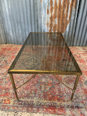 A large brass and glass Hollywood Regency rectangular coffee table