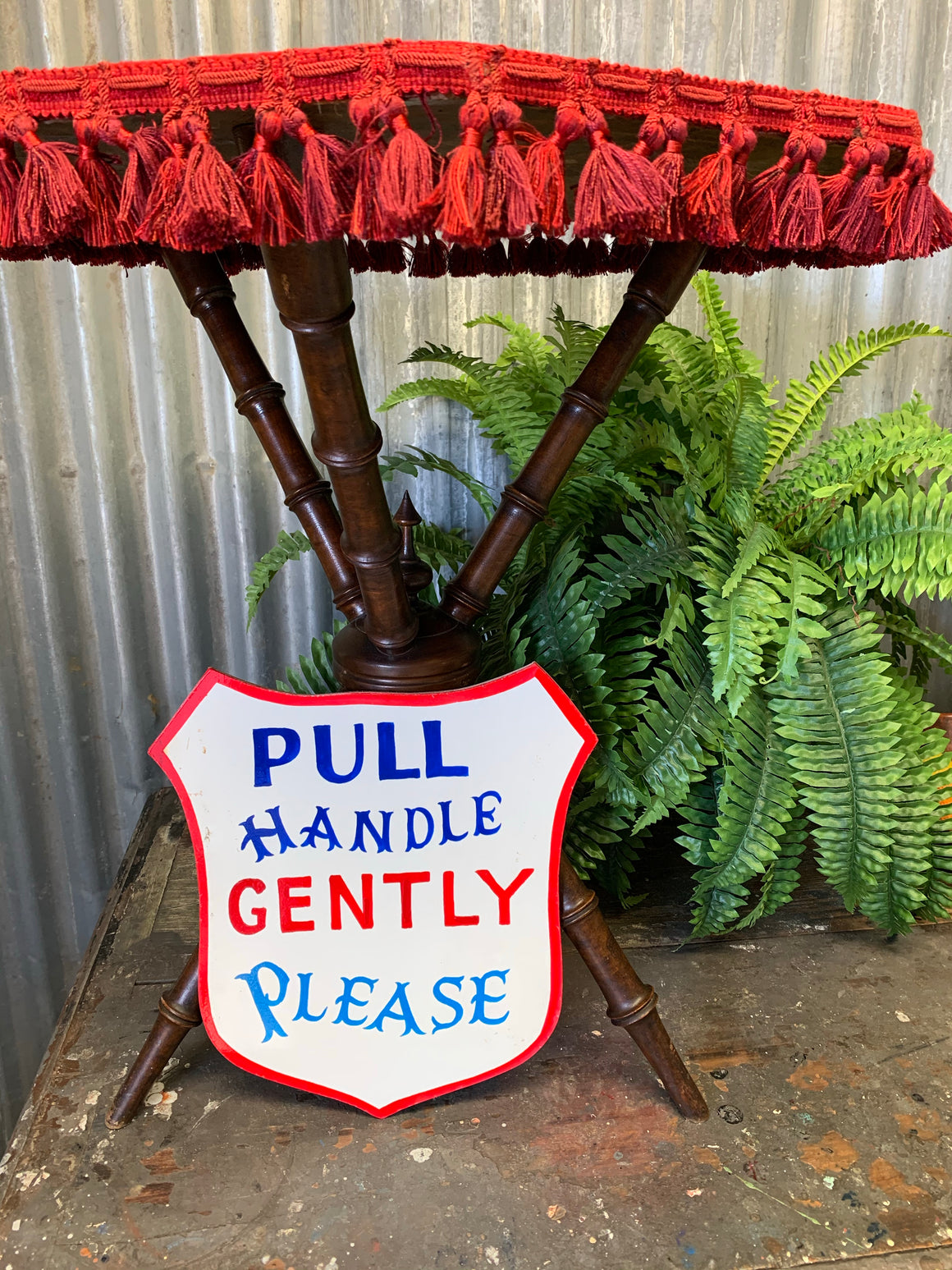 A hand painted fairground advertising sign - Pull Handle Gently!