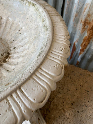 A large white Coalbrookdale cast iron fountain with dolphin detailing