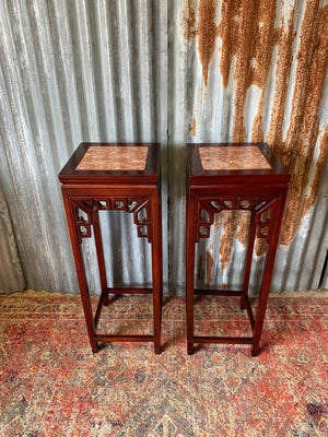 A pair of Chinese marble pedestal stands