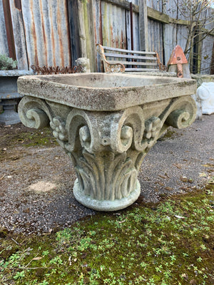 A cast stone Corinthian column stand