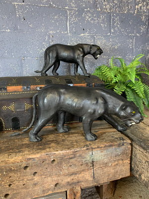 A large mid century black leather panther (56cm)