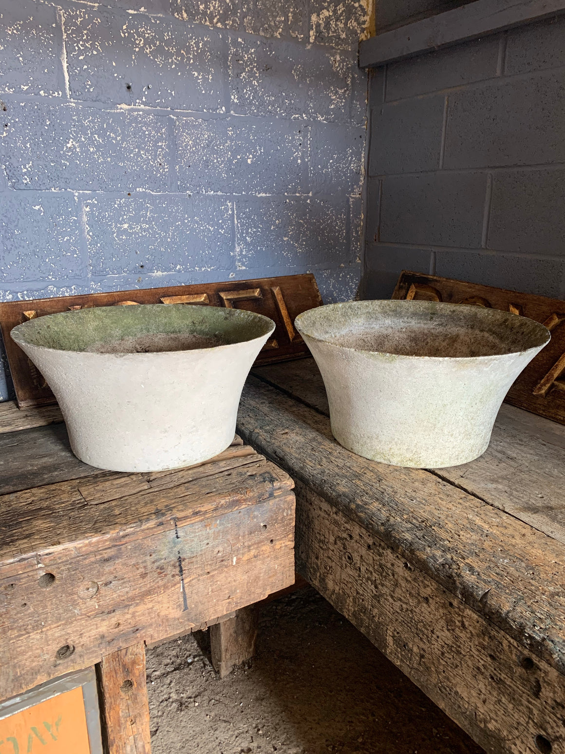 A pair of modernist conical garden planters after Willy Guhl