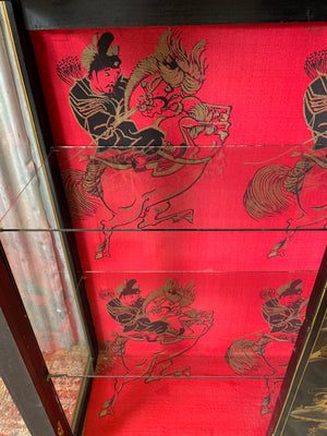 An ebonised Chinoiserie display cabinet