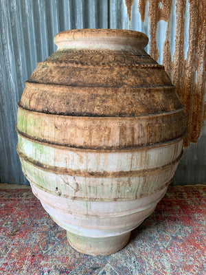 A very large beehive terracotta olive jar
