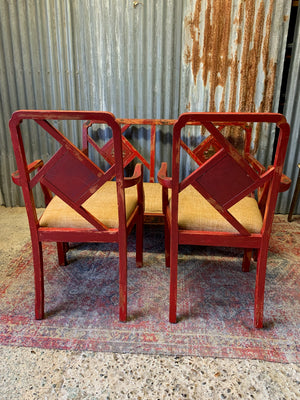 A red lacquered Chinoiserie bench and chair suite
