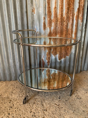 An Art Deco J M Doughty & Sons chrome and mirrored drinks trolley