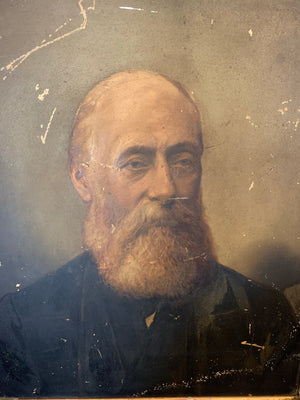 A Victorian oil painting of a bearded gentleman