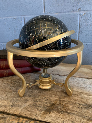 A celestial gemstone globe