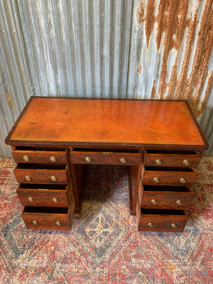 A leather pedestal desk