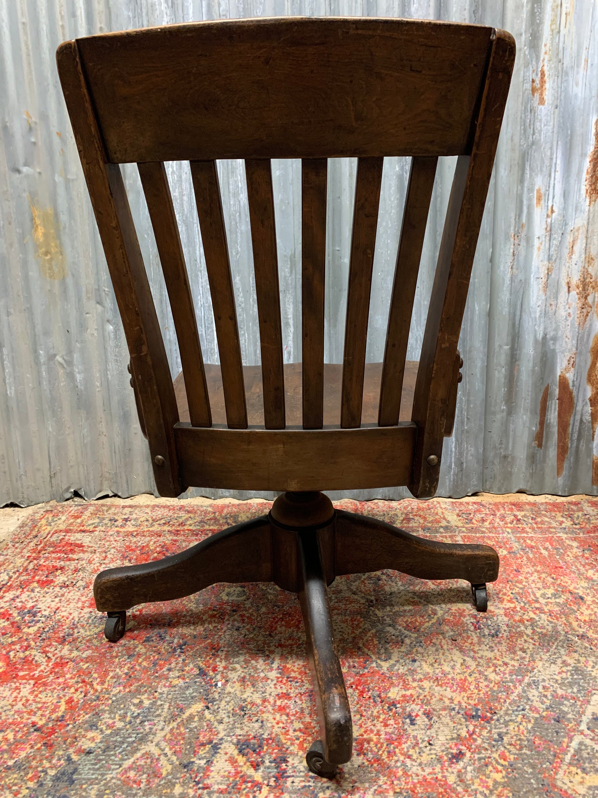 A wooden banker s swivel desk chair Belle and Beast Emporium