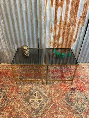 A pair of brass and glass Hollywood Regency side tables