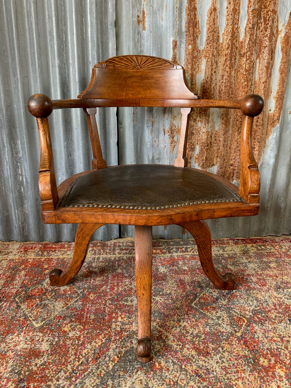 A Victorian ball arm desk chair