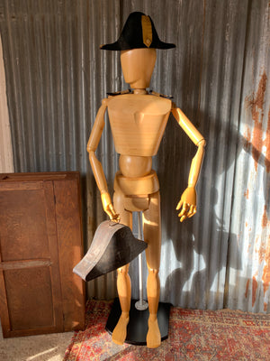An articulated full form artist’s lay figure