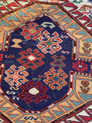 A Persian Caucasian flat weave rectangular rug