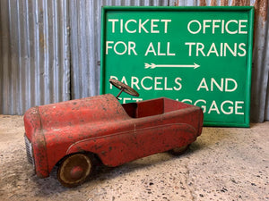 A Tri-ang Thunderbolt child's pedal car