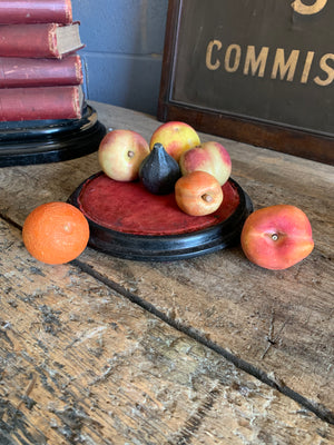A set of seven hand-painted alabaster fruits