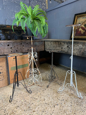 A white cast iron garden wine table or stand