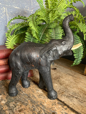 A black leather elephant figure