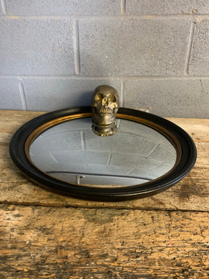 A large black and gold convex mirror ~ 58cm