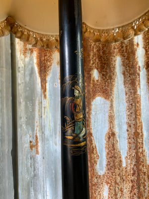 A black lacquer chinoiserie standard lamp with pagoda shade