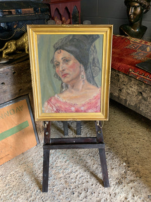 A large Spanish oil on canvas portrait of a lady in flamenco headdress