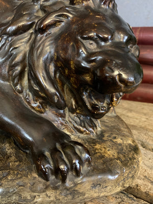 A large bronze effect plaster lion statue by Antoine Felix Boure