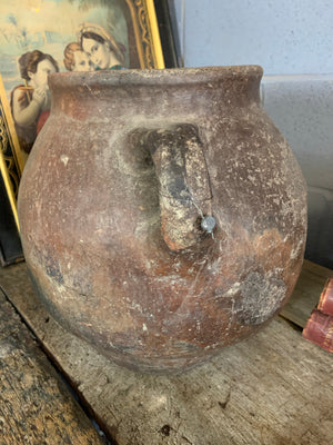 A large terracotta urn with double lug handles ~2