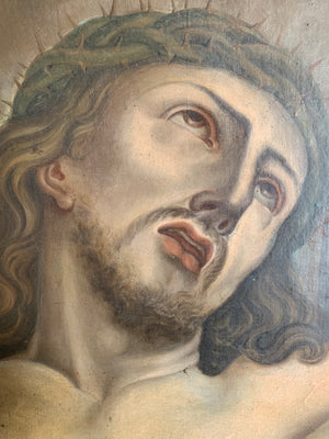 An original oil painting of Jesus on the cross